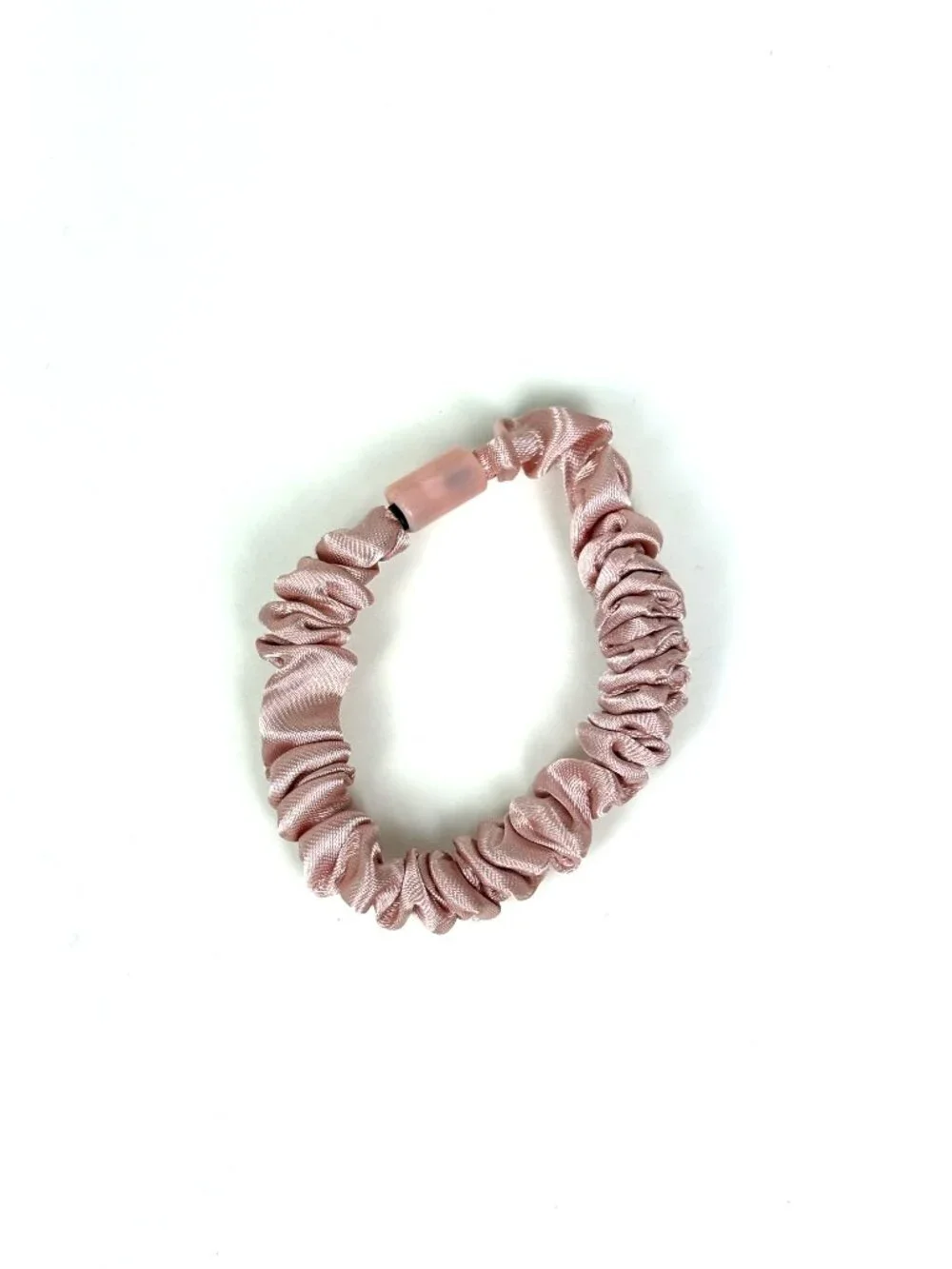 Skinny satin hair scrunchie / skinny hair tie in a light pink / blush shade. New